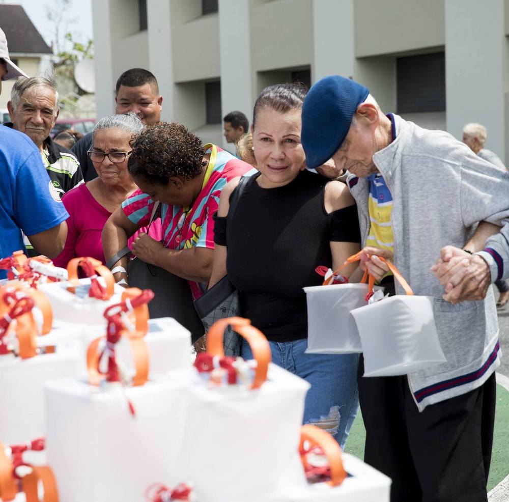 Distributing lanterns to those in need.