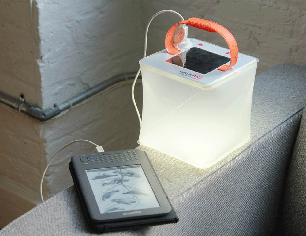 GIF showing the Max Power Lantern charging multiple devices, including a phone, GoPro Camera, and tablet