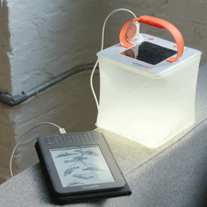 GIF of the Max Power Lantern charging a variety of devices, including a phone, a GoPro camera, and a tablet