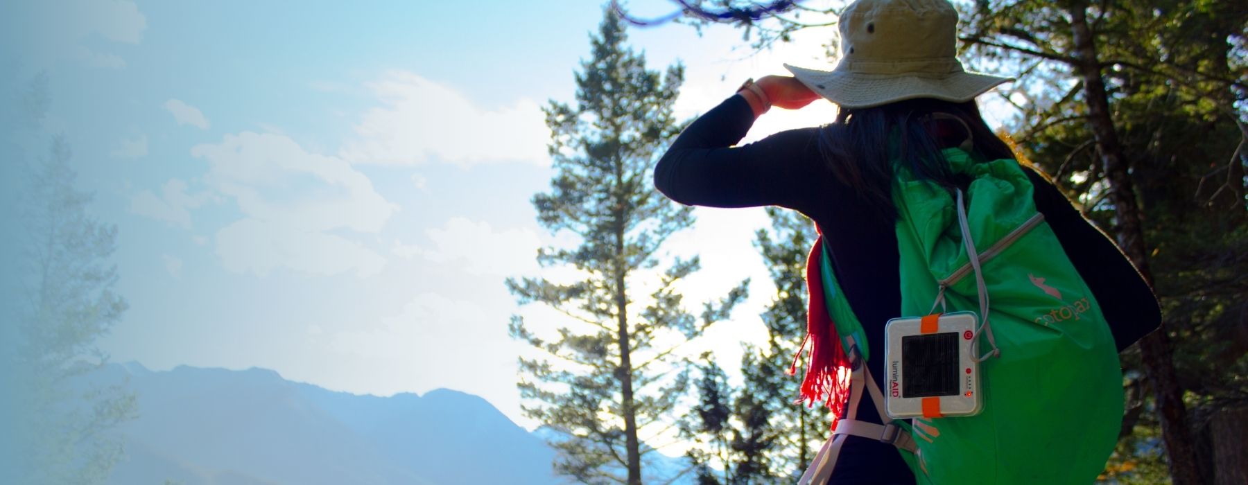 Hiker staring into the sunset