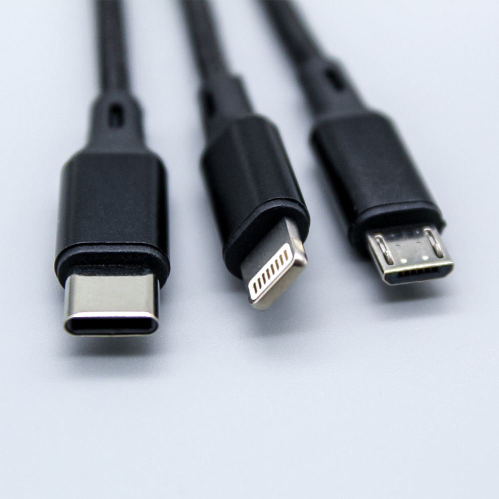 Close-up of 3 tips available on the cable: USB-C, Lightning, and Micro-USB