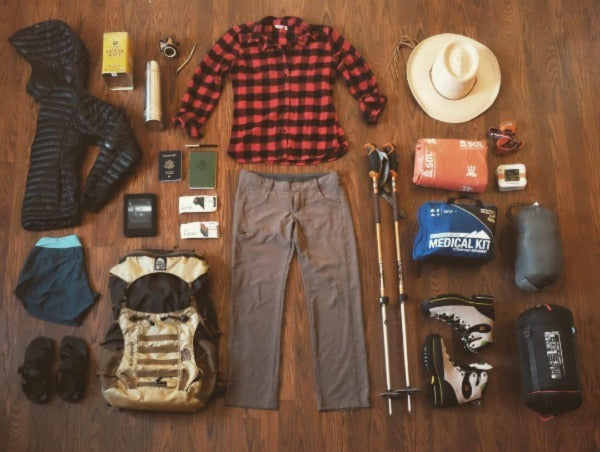 Clothes and hiking gear laid neatly on the floor. Source: @Stevieanna