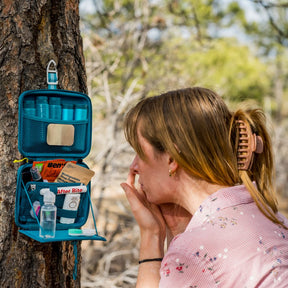 Woman putting in her contacts