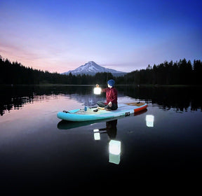 Stand Up paddling at night with Nova USB solar lanterns