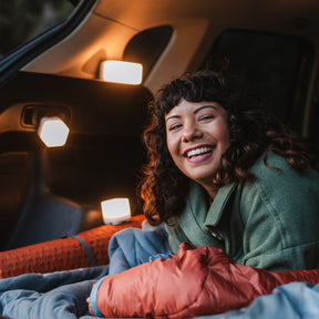 Woman in van with Trio lanterns