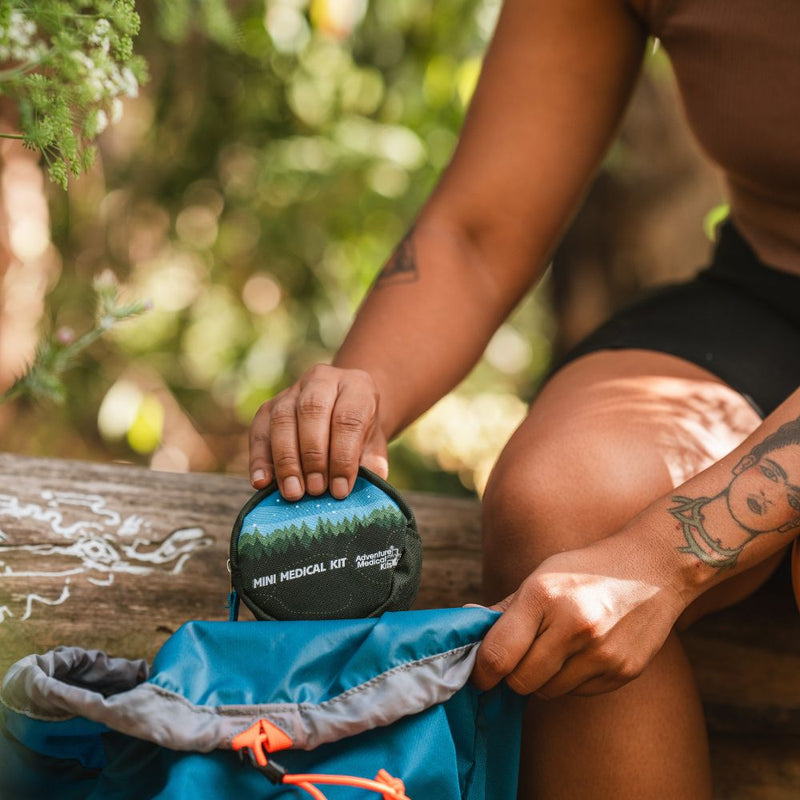 Mini Medical Kit being stored in a backpack