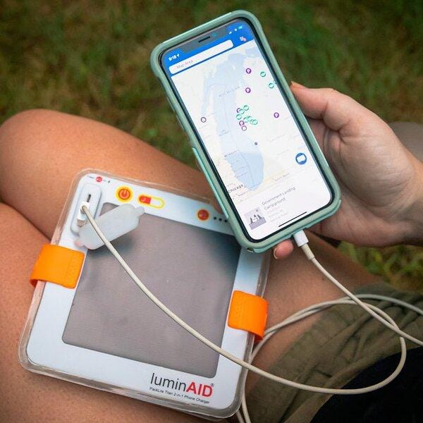 Titan charging a phone.