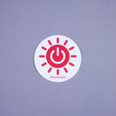Luminaid Sticker, sun logo and #luminaid.
