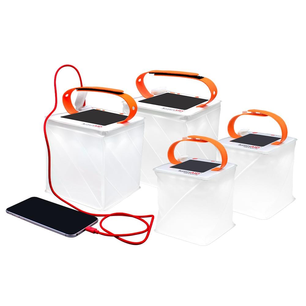 Nova solar lanterns light up the area, Titan power lanterns do as well, and also charge phones.